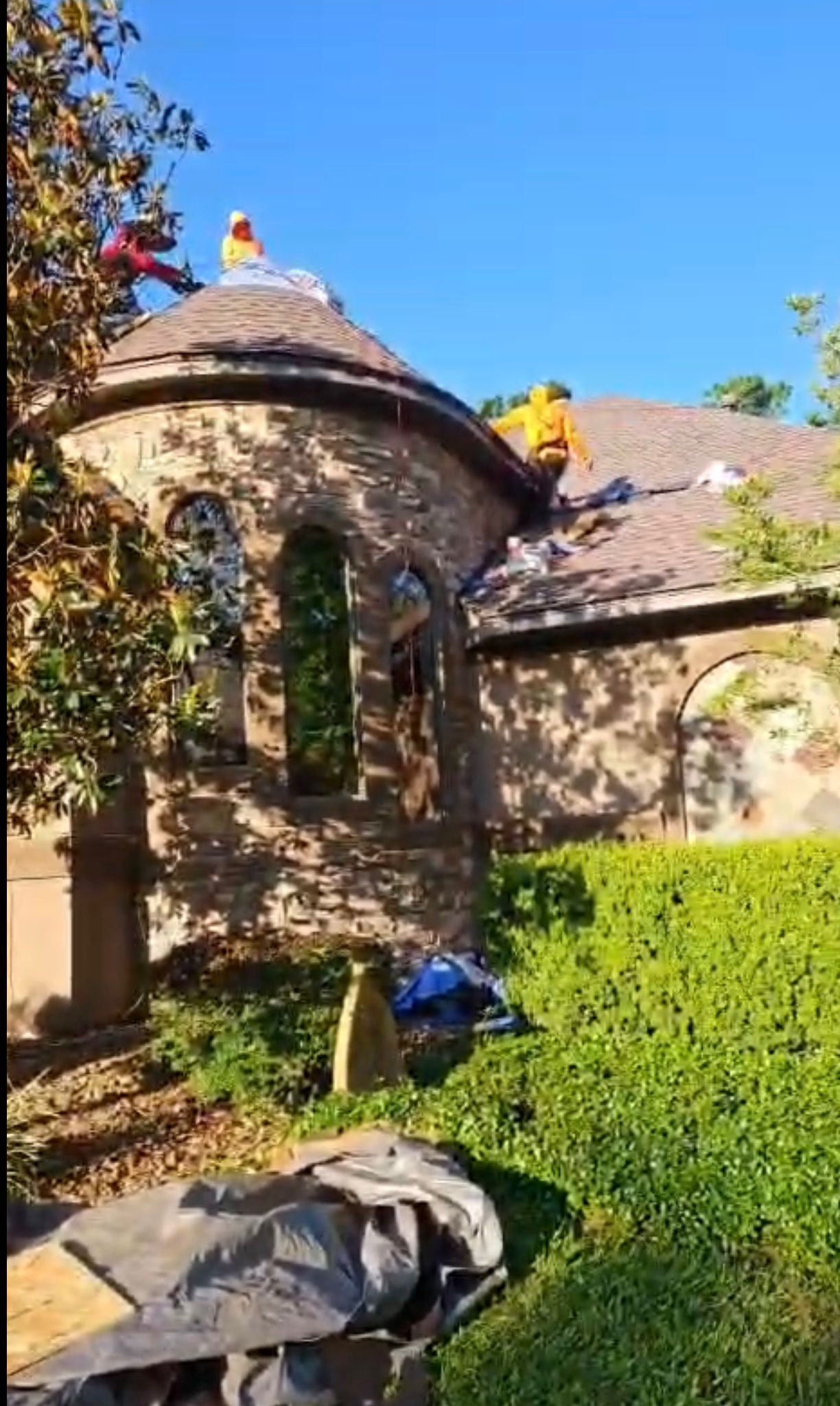 Roofing work in progress on a residential home